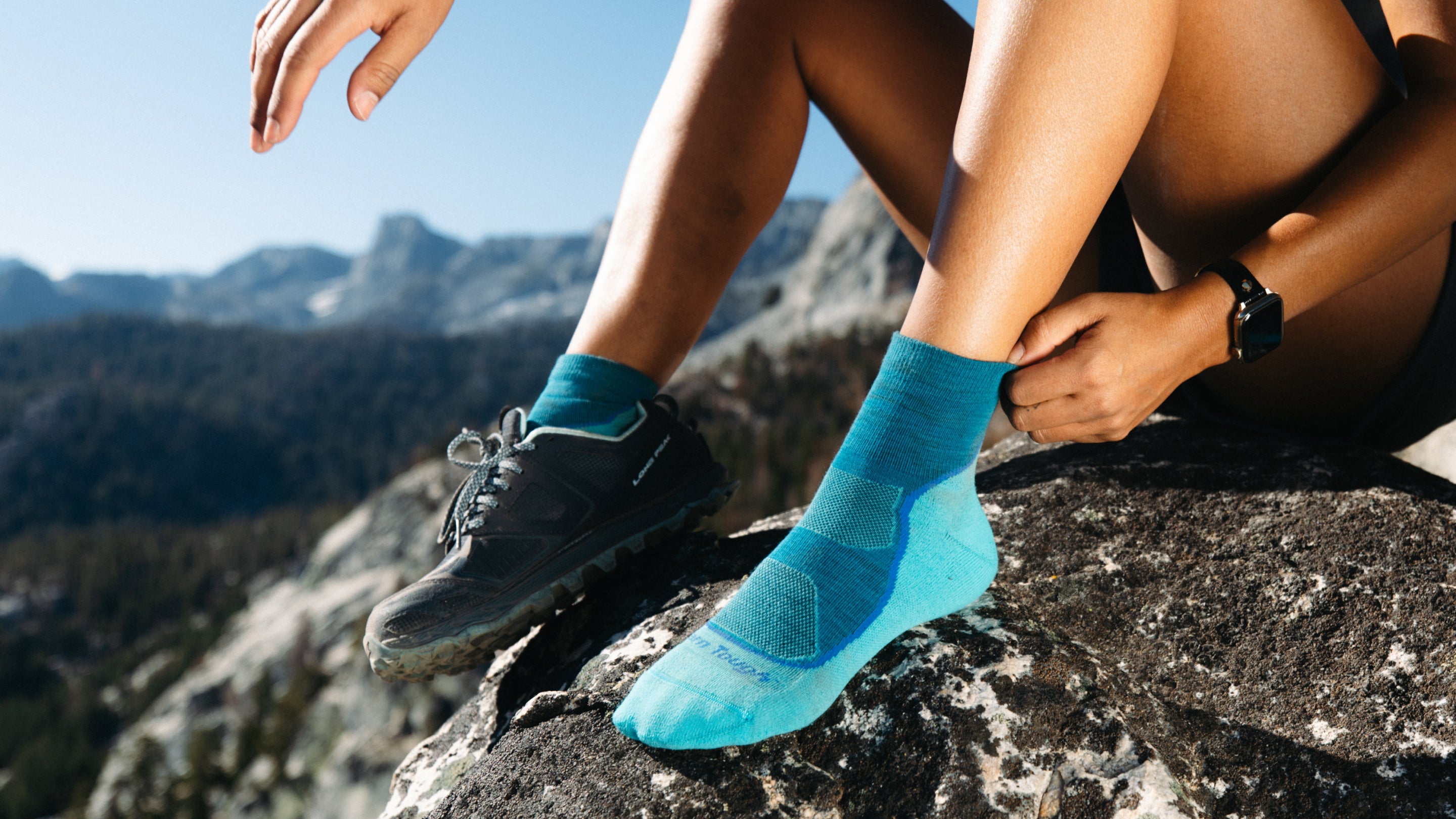 close up on model featuring the Women's Quarter Light Hiker sock